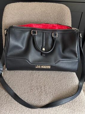 Love Moschino Black Pebbled Leather Weekender with Red Lining